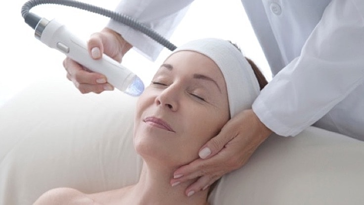 Facial treatment in progress for skincare rejuvenation.