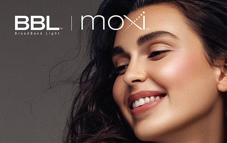 Smiling woman demonstrating BBL and Moxi treatments.