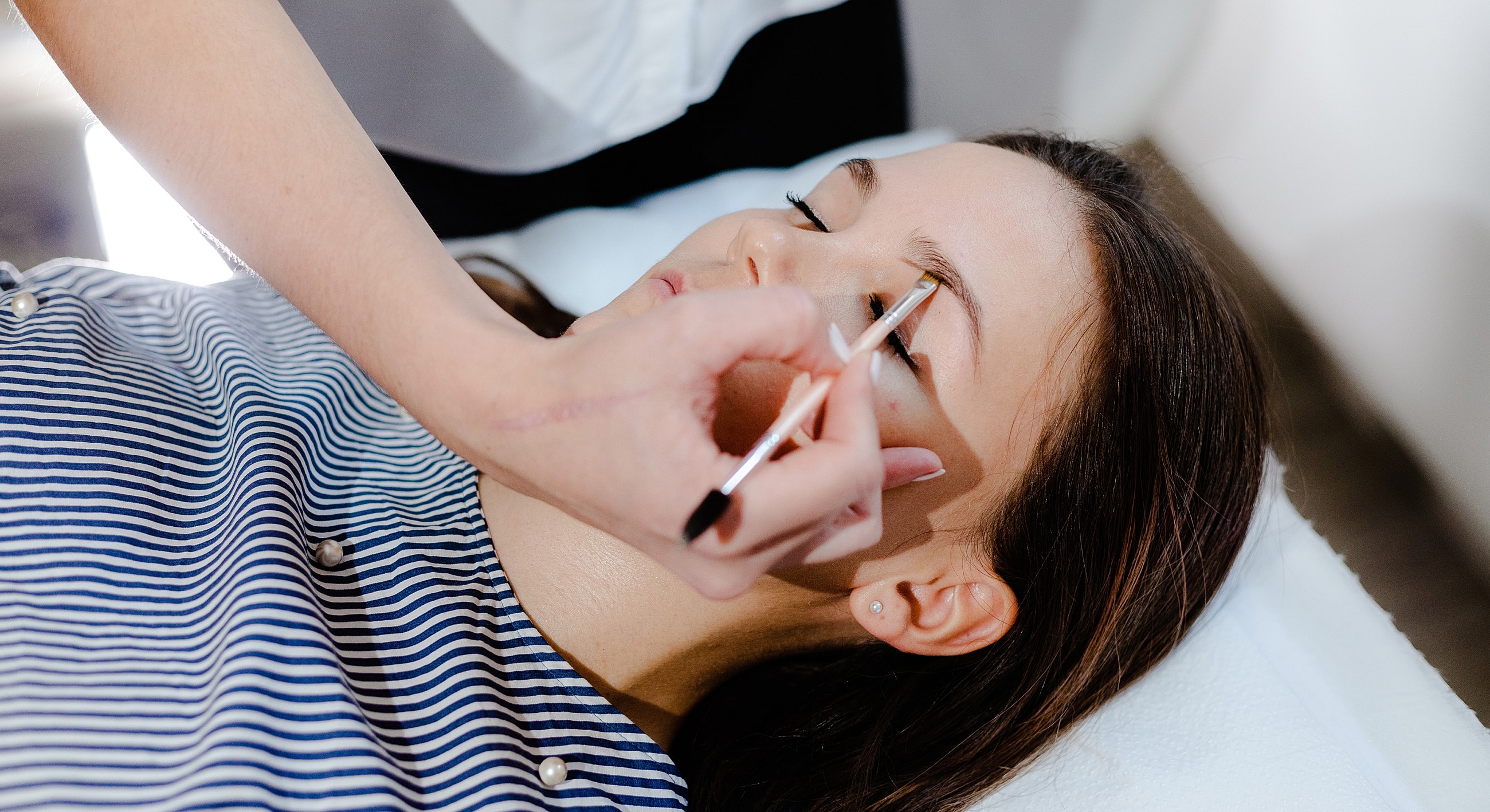 Roswell Eyebrow Tinting model with brown hair