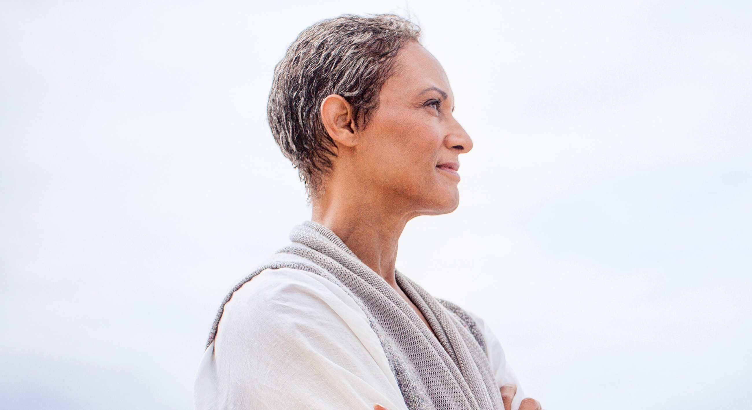 Roswell Wellness Shots model gazing thoughtfully into distance.